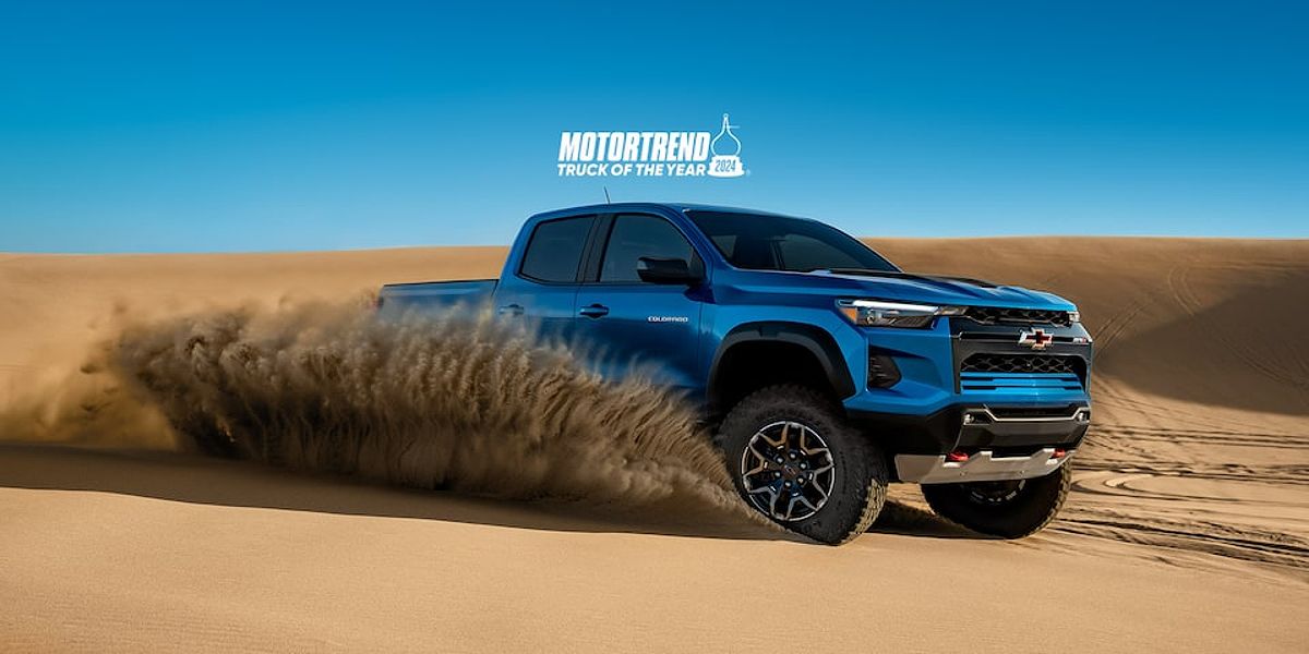 Chevy Colorado Driving Over Steep Sand Dunes