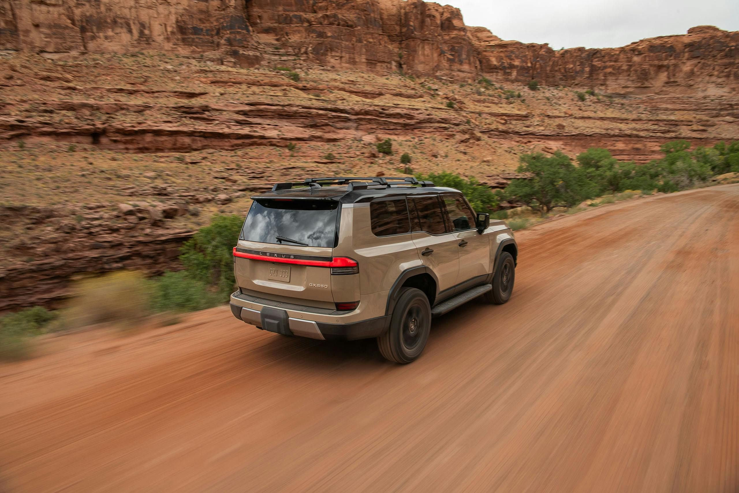 Lexus GX 550 Overtrail rear three quarter high on desert trail